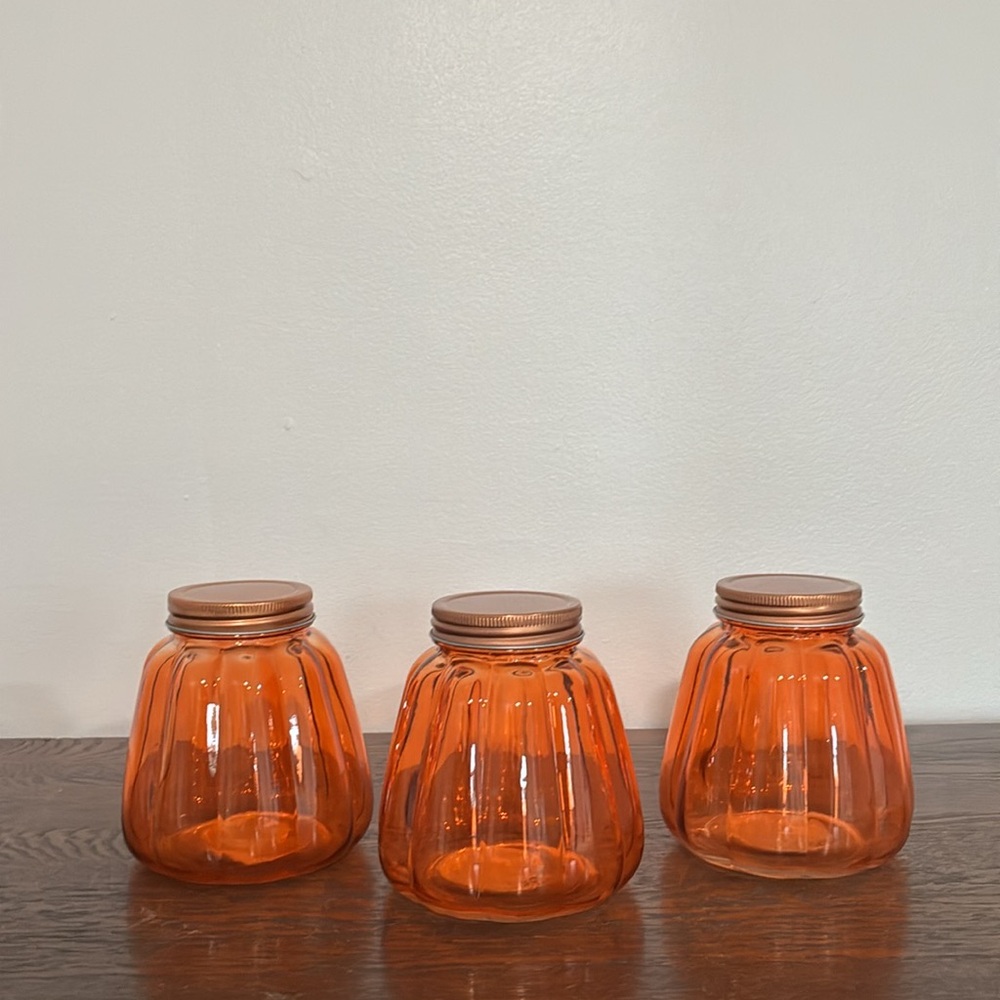 NWT- Set of 3- Beautiful Orange Glass Pumpkin Shaped Jars w/ Copper Lids
